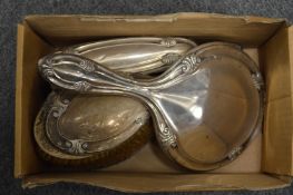 A silver backed dressing table set.