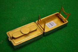 A silver and silver gilt travelling curling tong heater.