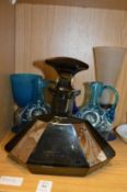 An art deco style cut glass scent bottle, pair of glass jugs and other items.