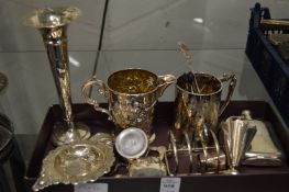 A good collection of small silverware to include a small hip flask, engraved tankard, toast rack,