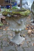 An urn shaped garden planter.