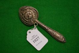 A babies silver rattle.