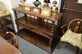 An oak three tier buffet.
