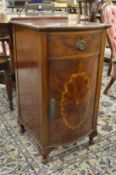 A good inlaid mahogany bow front bedside cupboard.,