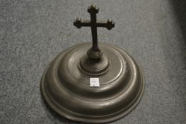 A large Continental pewter cover mounted with a crucifix, engraved inscription to the interior.