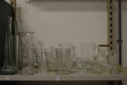 Glassware to include jugs, vases and candlesticks.