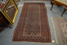 A Belouch rug 195cm x 105cm.