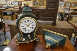 A 19th century Continental bracket clock with green and gilt painted decoration with matching