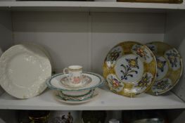A pair of French floral decorated tin glazed plates and other decorative china.