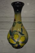 A small Moorcroft bud vase.