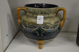 A Doulton cauldron shaped vase jardiniere (handle repaired).