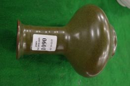 A Chinese green glaze bottle vase.