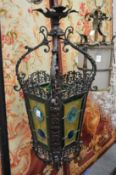 A good cast iron and stained glass leaded hall lantern.
