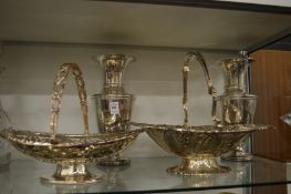 A pair of large plated vases and two plated cake baskets.