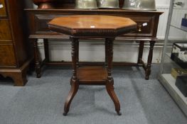 A Victorian walnut octagonal shaped centre table.