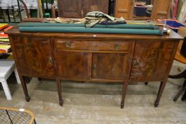 A mahogany sideboard.