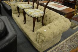 A Victorian Chesterfield settee.