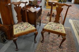 A good pair of George III fruitwood dining chairs with shaped cresting rails, vase shaped splats,