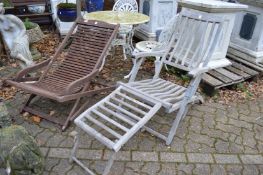 Two hardwood garden loungers.