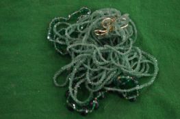 Green glass bead necklaces