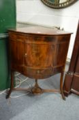 A mahogany corner washstand.
