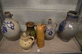 A collection of German salt glazed jugs and other items.