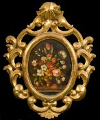 19th Century Continental School, a still life of flowers in an urn, oil on panel, 9.5