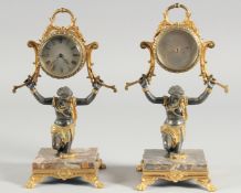A RARE PAIR OF 19TH CENTURY BRONZE, ORMOLU AND MARBLE FIGURES AS CLOCK & BAROMETER, both held