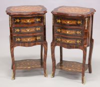 A PAIR OF LOUIS XVI DESIGN INLAID SERPENTINE SHAPED BEDSIDE CABINETS with three drawers, curving