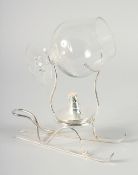 A BRANDY GLASS on a silver plated stand.
