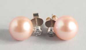A PAIR OF 18CT WHITE GOLD PINK PEARL AND DIAMOND EARRINGS.