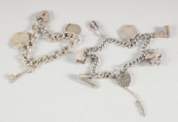 TWO SILVER CHARM BRACELETS.