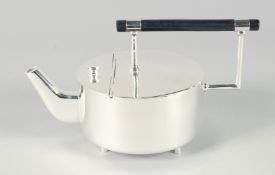 A CIRCULAR CHRISTOPHER DRESSER DESIGN SILVER PLATED CIRCULAR TEA POT. 5.25ins diameter.