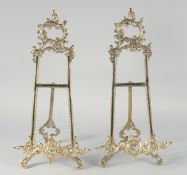A PAIR OF BRASS PICTURE EASELS. 21ins high.