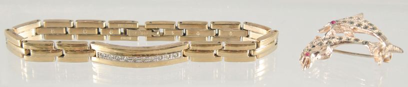 A SILVER BROOCH AND BRACELET.