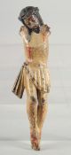 AN EARLY, POSSIBLY GERMAN, POLYCHROME CARVED WOOD CRUCIFIX.