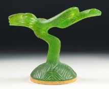 DAUM - A GREEN GLASS SNAKE ON A BRANCH, 'Daum France' etched to the underside. 4.5ins high