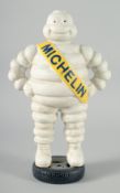 A LARGE PAINTED METAL MICHELIN MAN. 15ins high.
