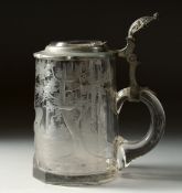 A GOOD BOHEMIAN CUT GLASS TANKARD AND COVER engraved with deer in a wood. 5ins high.