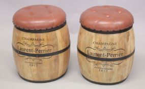 A PAIR OF CHAMPAGNE BARREL SEATS with studded leather seats.