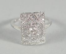 A GOOD ART DECO STYLE 18CT GOLD AND DIAMOND RING.