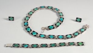 A GOOD DESIGNER SILVER AND ENAMEL BRACELET AND EARRINGS.