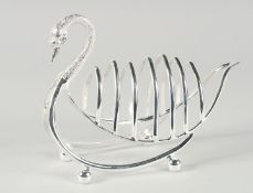 A SILVER PLATED SWAN SIX DIVISION TOAST RACK on ball feet. 6ins long.