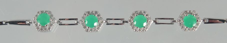 A SILVER EMERALD AND C Z BRACELET.