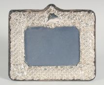 A SILVER RECTANGULAR PHOTOGRAPH FRAME 7ins x 8ins.