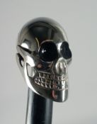 A NOVELTY SKULL'S HEAD WALKING STICK.