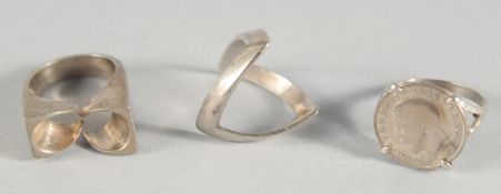 THREE SILVER RINGS.
