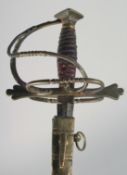A BRASS HILTED RAPIER with fullered double edge blade and engraved, signed blade in a brown