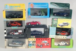 A TRAY OF TWELVE BOXED CARS.