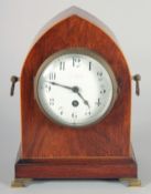 AN EDWARDIAN MAHOGANY MANTEL CLOCK, Maple and Co., London. 10ins high.